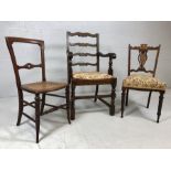 Three chairs - one oak carver, one rush-seated bedroom chair and an Edwardian upholstered chair with