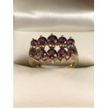 9ct Gold 375 hallmarked Ruby Cluster ring size 'M'