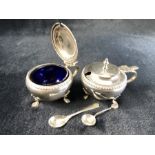 Two Silver Hallmarked lidded salts with Blue glass liners by William Neale & Son (Silver approx