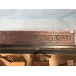 Carved Oak Plaque which reads "manners makeyth man" approx 106cm x 20cm