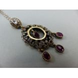 Silver 925 with gold plating in parts, Oval form Ruby and possibly CZ Pendant. Overall dimensions