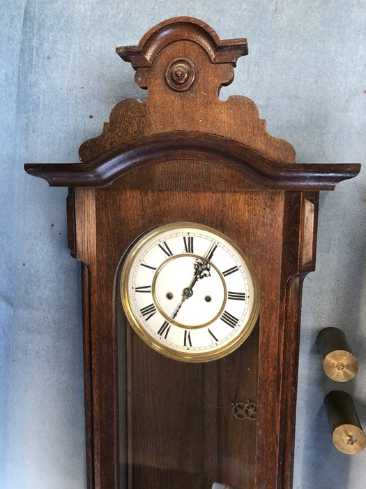 A mahogany-cased Vienna regulator wall clock, height 122cm approx with weights and pendulum