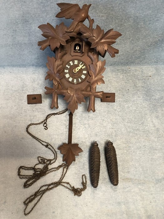 Carved Wooden cuckoo clock with pendulum and weights A/F