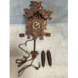 Carved Wooden cuckoo clock with pendulum and weights A/F