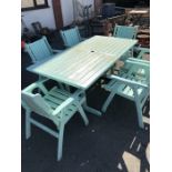 Large painted Garden table and six chairs, one chair A/F