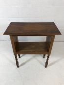 Oak two tier occasional table on turned legs