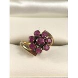 Gold (hallmark rubbed) Ruby Crossover ring size 'G'