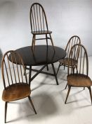 Ercol Dining table and four Stick back chairs