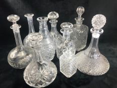 Collection of glass decanters of various styles and ages