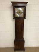 An oak longcase clock, the square brass 30cm dial with leaf scroll, Roman and Arabic chapter ring,