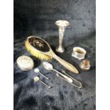 Collection of hallmarked silver to include a candle stick, sugar nips, spoons etc (approx 137g