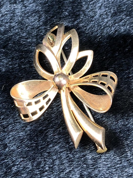 Gold front and back Brooch