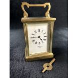 An Edwardian brass timepiece carriage clock by John Castle of London, movement marked "J" & "F" with