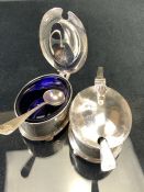 Pair of Hallmarked Silver lidded cruets by C Robathan & Son with matching spoons and original blue
