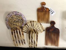 Collection of four Tortoise shell hair combs one with hand painted border