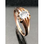 9ct Gold ring set with a cushion cut pale blue stone