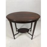 Victorian oval occasional table with suspended lower tier