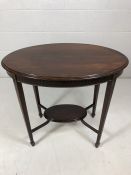Victorian oval occasional table with suspended lower tier