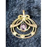 Gold Pendant with central Amethyst