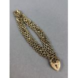 9ct Gold Bracelet marked 375 with heart shaped lock approx 7.1g