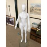 Manikin of a child on glass base