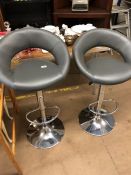 Pair of Grey upholstered bar stools (hydraulic)