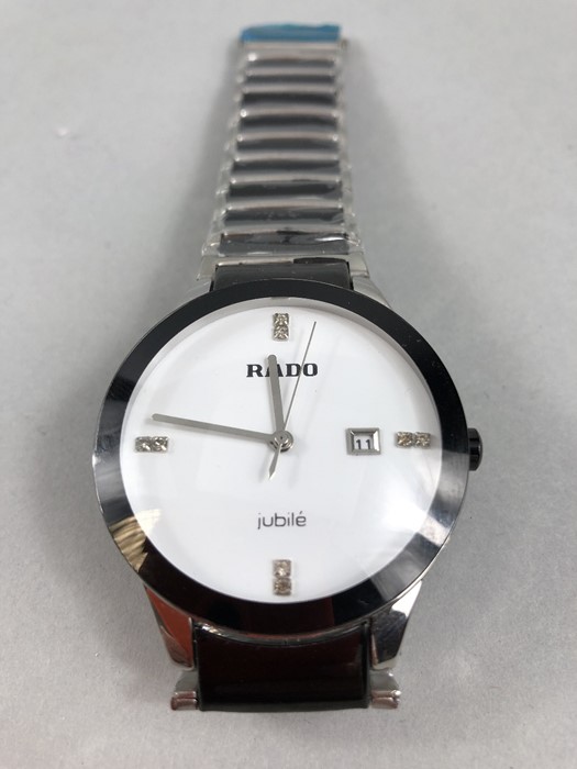 Stainless Steel large White faced watch marked RADO with date Aperture