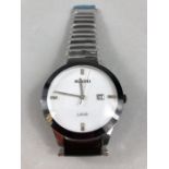Stainless Steel large White faced watch marked RADO with date Aperture