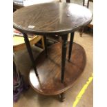 Oval coffee table along with a circular occasional table