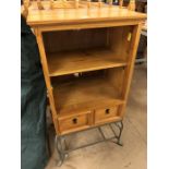 Pine shelving unit with two drawers on metal feet