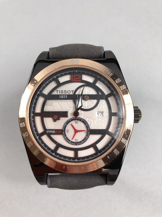 Large faced watch with Rose Gold Bessel and date Aperture marked Tissot