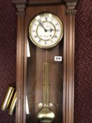 Reproduction Vienna mahogany cased two train wall clock, the dial inscribed `James Stewart,