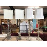 Four modern table lamps, two with round shades, two with square