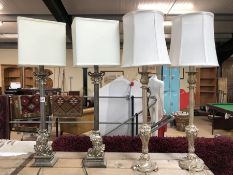 Four modern table lamps, two with round shades, two with square