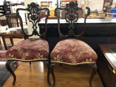 Pair of carved back chairs with upholstered seats