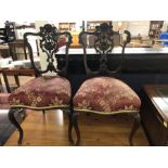 Pair of carved back chairs with upholstered seats