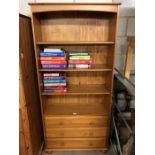 Modern bookcase with three drawers under