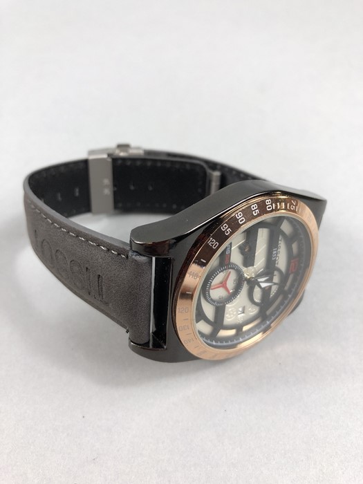 Large faced watch with Rose Gold Bessel and date Aperture marked Tissot