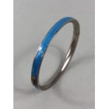 Silver Enamel (NO damage) Bangle. The sky blue enamel band measures approx: 5.77mm wide, stamped