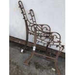 Pair of metal bench ends