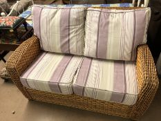 Two-seater conservatory sofa with newly re-covered cushions