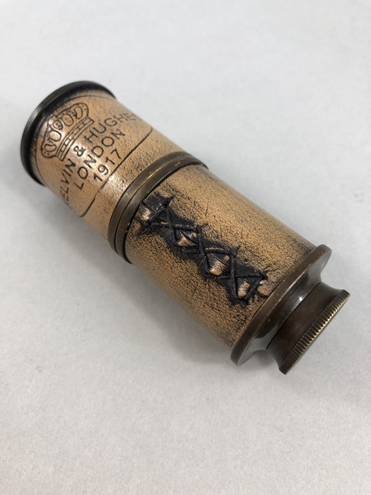 Pocket telescope with leather binding marked KELVIN & HUGHES LONDON 1917