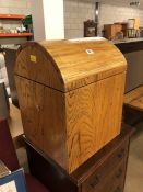 Dome top oak chest, converts to seat