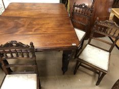 Victorian dining table extends to incorporate two leaves with six dining chairs