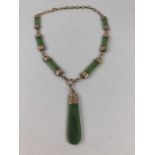 Vintage 16½“Jadeite Necklace, comprising 6 (3 each side) approx: 34mm (including end caps) x 7.8mm x