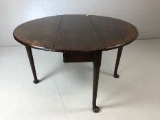 Mahogany drop leaf table on Queen Anne legs