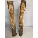 Two Unique carved logs with faces of Indians approx 155cm tall