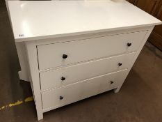 White chest of three drawers with metal handles