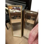 Two oblong mirrors