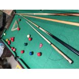 Snooker table on legs with selection of cues approx. 189cm x 97cm with full set balls etc